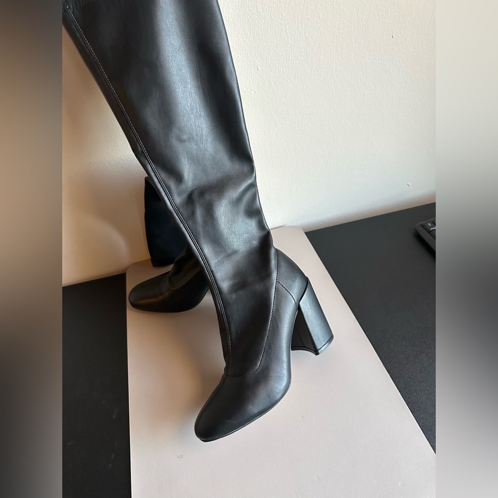 Tall faux leather boots